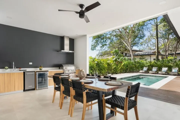 Casa 8 at Entroterra, with outdoor dining beside the pool